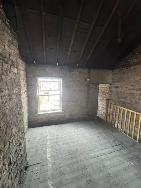 Upper room stripped back